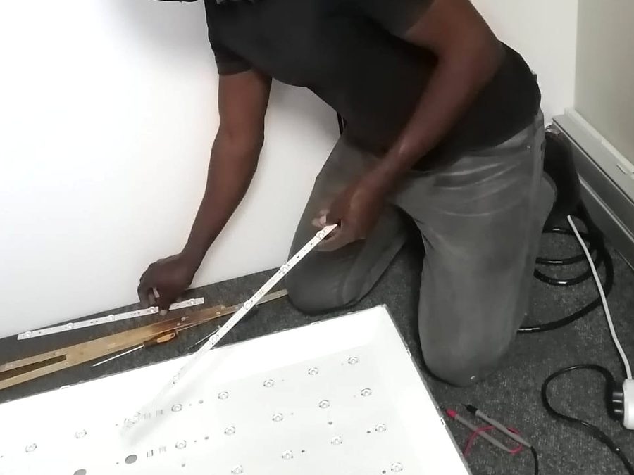 Fitting new LED backlight strips into an open television panel